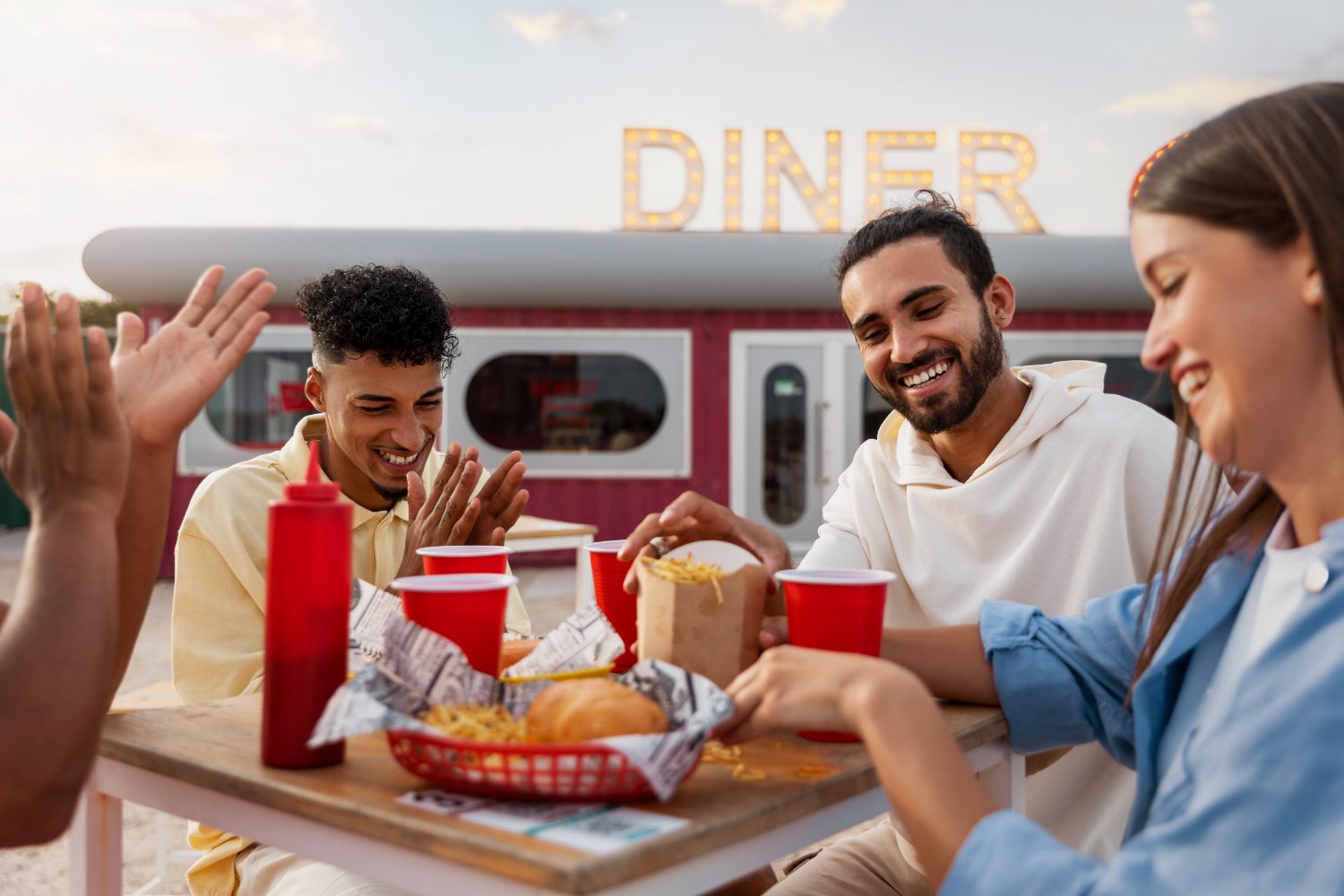 people eating at diner truck